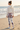 Ivory hoodie and leggings, shoreline rear view