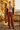Jardin Noir with rust trousers