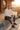 Joggers styled with an ivory sweatshirt at an alpine lodge