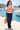 Layered marina look with navy tailored trousers