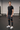 Leggings with charcoal sports shorts in a gym