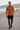 Leggings with running shorts on a coastal promenade