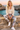 Linen-layered leggings look at a sunset cove
