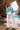 Look 3 redo: Santorini brunette woman, sea cave archway