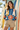 Look 4: beach shack with surfboards
