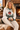 Look 9: female model, lodge fireside