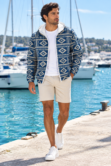 Male marina look with open windbreaker and sand shorts