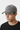 Male model - charcoal grey cap three-quarter profile