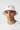 Male model close-up wearing white bucket hat relaxed