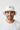 Male model close-up wearing white bucket hat