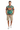 Male model in beige chino shorts and white sneakers