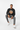 Male model in black sweatshirt with gray joggers
