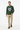 Male model in bottle green crewneck with khaki chino pants