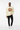 Male model in ivory sweatshirt with black jeans