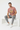 Male model in mauve tee with gray joggers