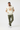 Male model in olive green cargo pants and white sneakers