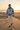 Male model in Ridgeline hoodie at sunset dunes
