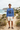 Male model in royal blue crewneck on beach path