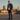 Male model in turquoise tribal hoodie - layered with bomber jacket