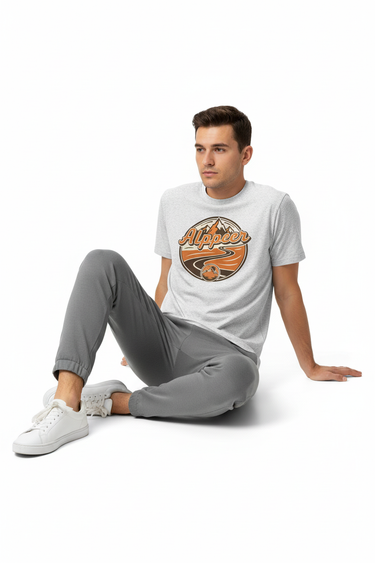 Male model in white fleck tee with gray joggers