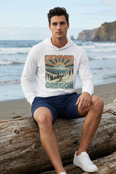 Male model in white mountain graphic tee and navy shorts