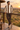 Male model overlooking the Botswana savannah at sunset
