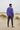 Male model showcasing the sweatshirt back with joggers