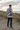 Male model showcasing the sweatshirt back with joggers