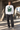 Male model wearing the ODDSON long-sleeve tee in an underpass