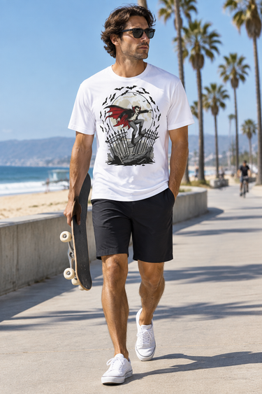Male model wearing the white vampire skate tee on a beach boardwalk