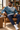 Male relaxed reading-chair look with navy joggers