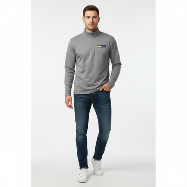 Man in iron grey lightweight quarter-zip pullover with dark denim