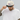 Man touching brim of natural and black snapback