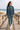 Matching hoodie and joggers on beach boardwalk