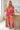 Matching tie-dye set styled for morning coffee
