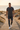 Men’s leggings on a coastal boardwalk