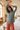 Model stretching in the palm-print pajama top
