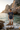 Navy graphic tee styled at a Mediterranean cove