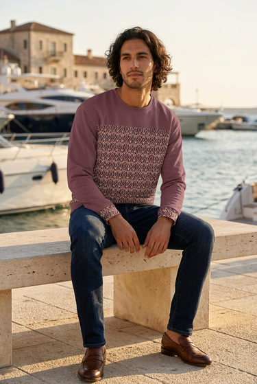 New male model seated at the marina
