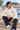 Oatmeal Heather ODDSON hoodie seated steps look