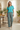 Palm-print pajama pants with turquoise sleep shirt
