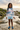 Pastel palm rash guard editorial look