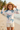 Pastel palm rash guard editorial look