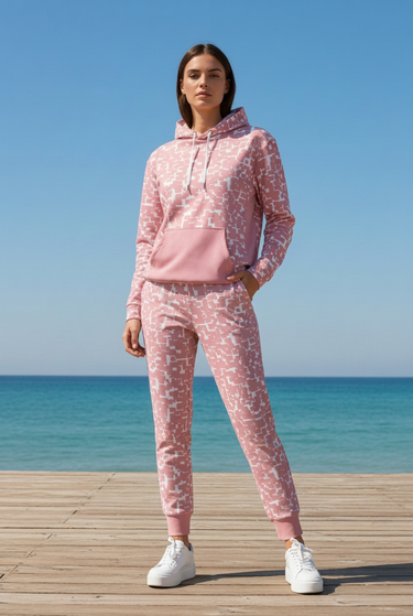 Pink patterned hoodie with matching joggers by the sea