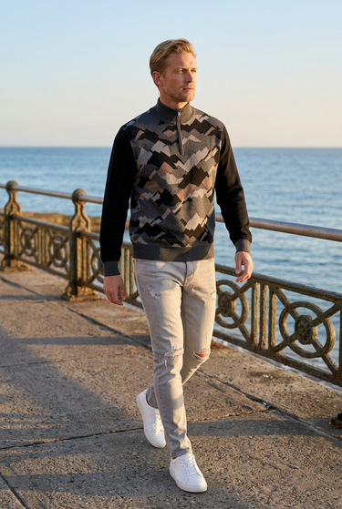 Quarter-zip coastal editorial with gray distressed jeans