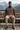 Quarter-zip sweater seated chalet editorial