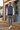 Quarter-zip with gray corduroys