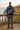 Quarter-zip with olive cargos on a coastal terrace