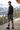 Racing joggers back view on a resort terrace