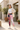 Rose-print leggings styled with a cream overshirt